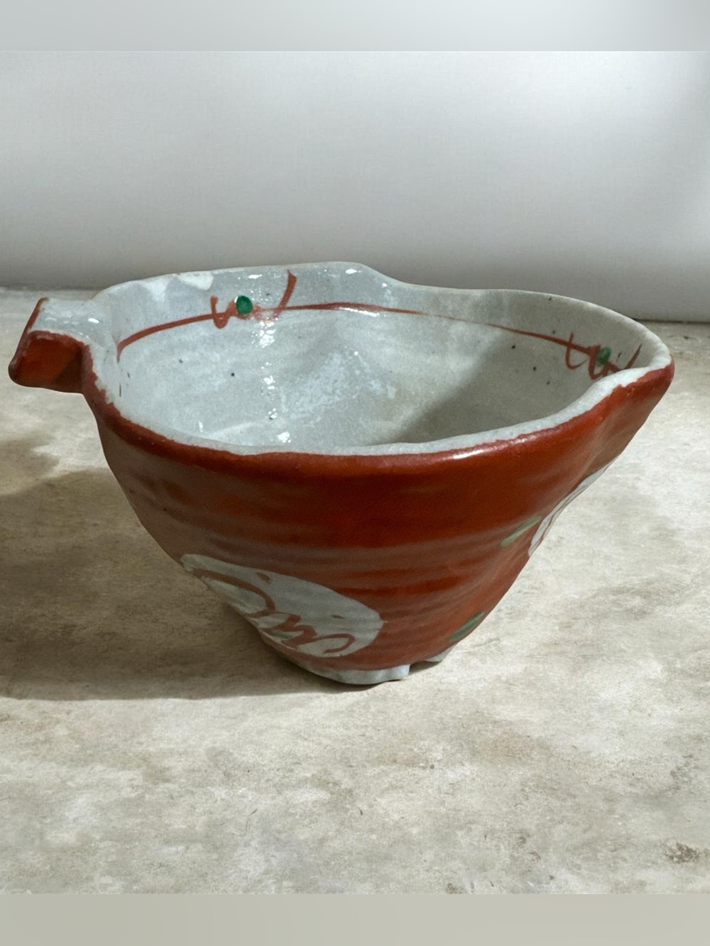 Handmade Rust and White Ceramic Serving Bowl with attached Spoon Rest